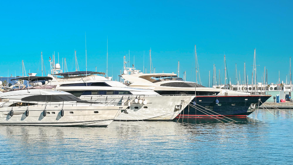 Captain at helm of yacht